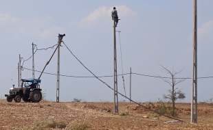 Electrical line erection in progress